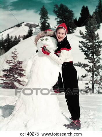 1940S 1950S Smiling Woman Holding Cigar In Snowman’S Mouth View Large Photo Image Stock Photography - 1940S 1950S Smiling Woman Holding Cigar In Snowman’S Mouth. Fotosearch