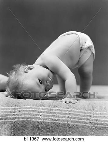 1940S Baby Bending Down With Head On Blanket View Large Photo Image Stock Photo - 1940S Baby Bending Down With Head On Blanket. Fotosearch