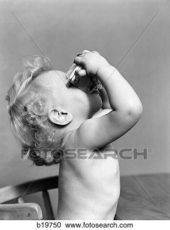 1940S Baby Drinking From Cup View Large Photo Image Stock Image - 1940S Baby Drinking From Cup. Fotosearch