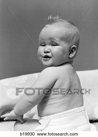 1940S Baby In Diaper Looking Back Over Shoulder With Funny Facial Expression View Large Photo Image Stock Image - 1940S Baby In Diaper Looking Back Over Shoulder With Funny Facial Expression. Fotosearch