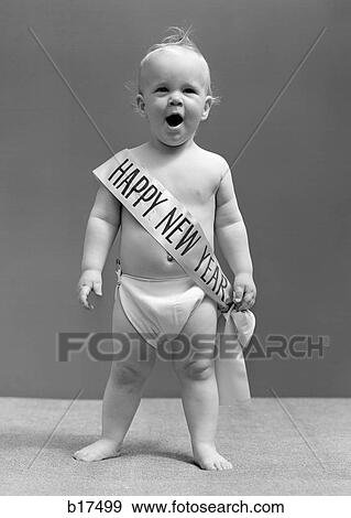 1940S Baby Standing In Diaper Yawning Wearing Happy New Year Sash View Large Photo Image Stock Photo - 1940S Baby Standing In Diaper Yawning Wearing Happy New Year Sash. Fotosearch
