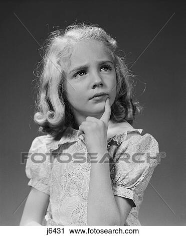 1940S Blond Girl Portrait Finger To Chin Thinking Serious Expression View Large Photo Image Stock Image - 1940S Blond Girl Portrait Finger To Chin Thinking Serious Expression. Fotosearch