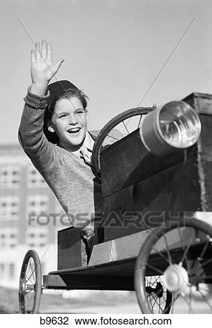 1940S Boy In Homemade Race Car Go-Cart Smiling And Waving Soapbox Derby View Large Photo Image Stock Image - 1940S Boy In Homemade Race Car Go-Cart Smiling And Waving Soapbox Derby. Fotosearch