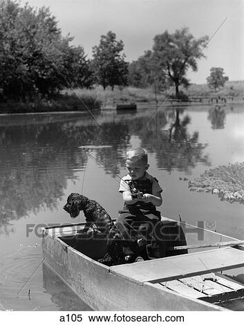 1940S Boy With A Black Cocker Spaniel Fishing In Boat On Lake View Large Photo Image Stock Photography - 1940S Boy With A Black Cocker Spaniel Fishing In Boat On Lake. Fotosearch