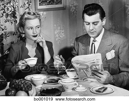 https://fscomps.fotosearch.com/compc/CLT/CLT006/1940s-couple-breakfast-table-impatient-stock-photograph__bo001019.jpg