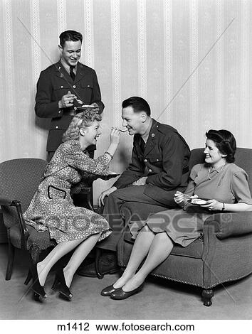 1940S Couples Eating Dessert Men In Uniform Woman Spoon Feeding Man View Large Photo Image Stock Image - 1940S Couples Eating Dessert Men In Uniform Woman Spoon Feeding Man. Fotosearch