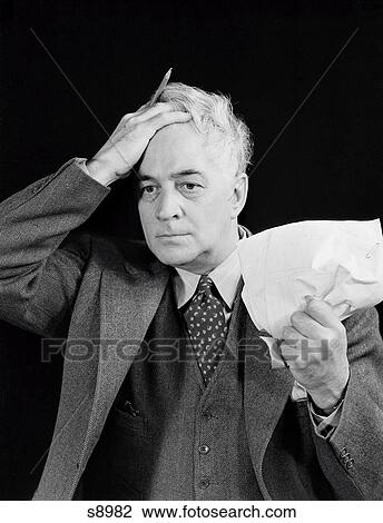 1940S Older Man Crumpled Paper In One Hand Holding Other Hand To Head Frustrated Expression Indoor View Large Photo Image Stock Image - 1940S Older Man Crumpled Paper In One Hand Holding Other Hand To Head Frustrated Expression Indoor . Fotosearch