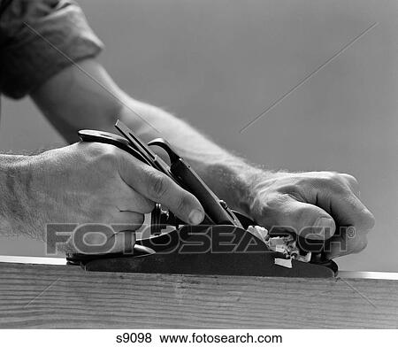 1940S Side View Of Man'S Hands Using Plane View Large Photo Image Stock Photo - 1940S Side View Of Man'S Hands Using Plane. Fotosearch