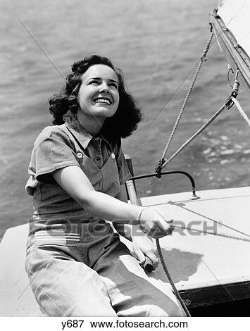 1940S Woman Sailor Smiling Sailing Boat Outdoor View Large Photo Image Stock Photo - 1940S Woman Sailor Smiling Sailing Boat Outdoor. Fotosearch