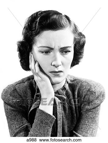 1940S Worried Woman Frowning Holding Hand To Cheek View Large Photo Image Stock Photo - 1940S Worried Woman Frowning Holding Hand To Cheek. Fotosearch