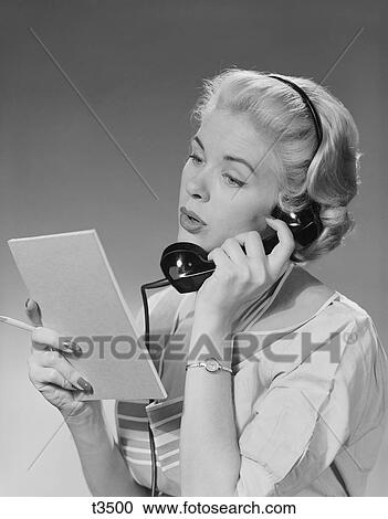1950S 1960S Blond Woman Talking On Telephone Reading List View Large Photo Image Stock Image - 1950S 1960S Blond Woman Talking On Telephone Reading List. Fotosearch