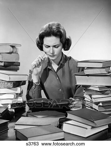 1950S 1960S College Woman Studying Surrounded All Around By Piles Of Books View Large Photo Image Stock Image - 1950S 1960S College Woman Studying Surrounded All Around By Piles Of Books. Fotosearch