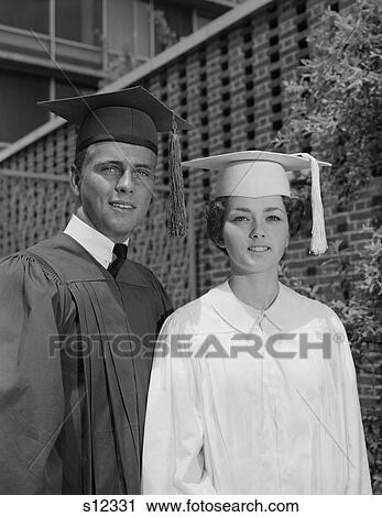 1950S 1960S Graduation Couple In Cap And Gown View Large Photo Image Stock Image - 1950S 1960S Graduation Couple In Cap And Gown. Fotosearch