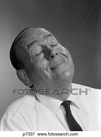 1950S 1960S Happy Balding Man With Expression Of Satisfaction And Eyes Closed Smiling View Large Photo Image Stock Photo - 1950S 1960S Happy Balding Man With Expression Of Satisfaction And Eyes Closed Smiling. Fotosearch