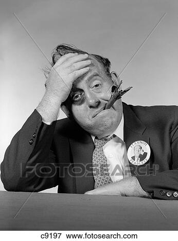 Stock Photo - 1950S 1960S Politician With Black Eye & Ragged Cigar Facing Camera. Fotosearch