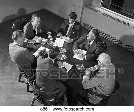 1950S 1960S Six Businessmen Executives Managers Salesmen Meeting Around Corporate Conference Table View Large Photo Image Stock Image - 1950S 1960S Six Businessmen Executives Managers Salesmen Meeting Around Corporate Conference Table. Fotosearch