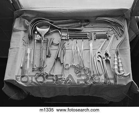 1950S 1960S Tray Displaying An Array Of Medical And Surgical Instruments View Large Photo Image Stock Photography - 1950S 1960S Tray Displaying An Array Of Medical And Surgical Instruments . Fotosearch