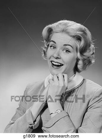 1950S 1960S Woman Clasped Hand By Chin With Wishful Hoping Happy Joyful Facial Expression View Large Photo Image Stock Photo - 1950S 1960S Woman Clasped Hand By Chin With Wishful Hoping Happy Joyful Facial Expression. Fotosearch