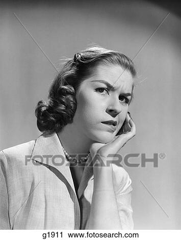 1950S 1960S Woman Portrait Worried Facial Expression Hand To Cheek Tooth Pain View Large Photo Image Stock Image - 1950S 1960S Woman Portrait Worried Facial Expression Hand To Cheek Tooth Pain . Fotosearch