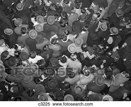 1950S Aerial View Of Crowd Of Men And Women In Times Square Nyc Celebrating New Years Many Hats Outdoor View Large Photo Image Stock Photography - 1950S Aerial View Of Crowd Of Men And Women In Times Square Nyc Celebrating New Years Many Hats Outdoor. Fotosearch