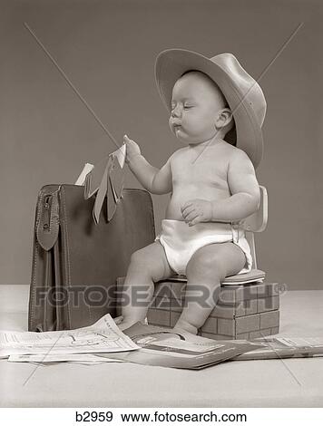 Stock Photo - 1950S Baby Businessman In Diaper With Hat Briefcase Salesman Samples Paperwork. Fotosearch