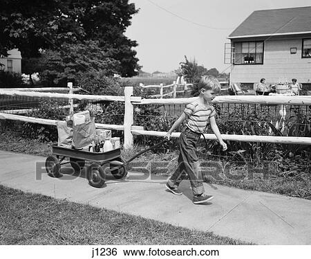 1950S Boy Pulling Groceries In Wagon View Large Photo Image Stock Photograph - 1950S Boy Pulling Groceries In Wagon. Fotosearch