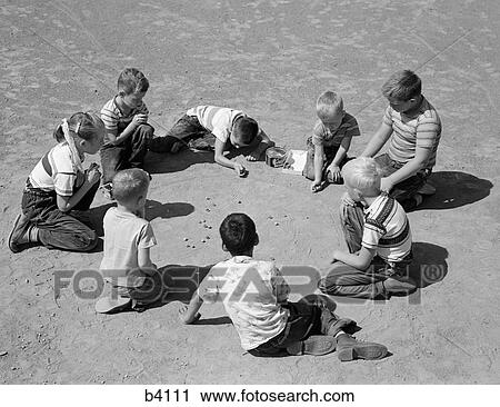 1950S Boys & Girls Shooting Marbles View Large Photo Image Stock Image - 1950S Boys & Girls Shooting Marbles. Fotosearch