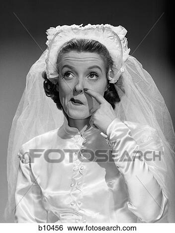 1950S Bride Scratching Nose And Looking Up View Large Photo Image Stock Photograph - 1950S Bride Scratching Nose And Looking Up. Fotosearch