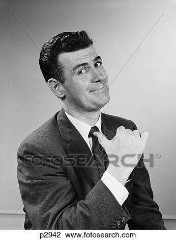 Stock Image - 1950S Business Man Smiling Giving Thumbs Up Sign Pointing To Himself Looking At Camera. Fotosearch
