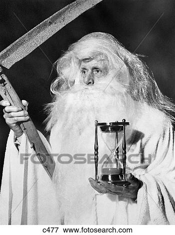 1950S Costume Elderly Man Long Beard Angel Of Death Sickle Scythe Hourglass Father Time View Large Photo Image Stock Photo - 1950S Costume Elderly Man Long Beard Angel Of Death Sickle Scythe Hourglass Father Time. Fotosearch