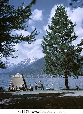 Stock Image - 1950S Family Jackson Lake Grand Teton National Park Wyoming Lake Tent. Fotosearch