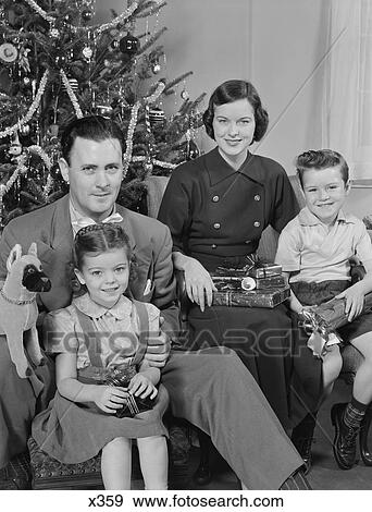 1950S Family Portrait By Christmas Tree Looking At Camera View Large Photo Image Stock Photo - 1950S Family Portrait By Christmas Tree Looking At Camera. Fotosearch