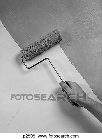 Stock Photography - 1950S Hand Using Paint Roller On Wall. Fotosearch