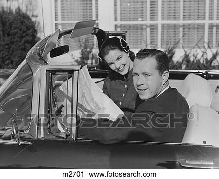 1950S Husband Wife Man Woman In Automobile Reading Map View Large Photo Image Stock Image - 1950S Husband Wife Man Woman In Automobile Reading Map . Fotosearch