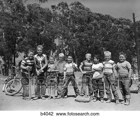 1950S Line-Up Of 9 Boys In Tee Shirts With Bats & Mitts Facing Camera View Large Photo Image Stock Image - 1950S Line-Up Of 9 Boys In Tee Shirts With Bats & Mitts Facing Camera . Fotosearch