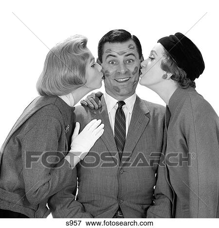 1950S Man Smiling Face Covered With Lipstick Kiss Marks After Being Kissed By Two Women From Both Sides View Large Photo Image Stock Photo - 1950S Man Smiling Face Covered With Lipstick Kiss Marks After Being Kissed By Two Women From Both Sides. Fotosearch