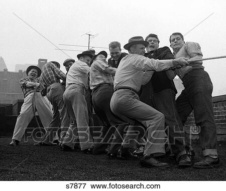1950S Men Playing Tug-Of-War View Large Photo Image Stock Photo - 1950S Men Playing Tug-Of-War. Fotosearch