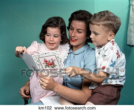 1950S Mother Looking At Greeting Card With Children View Large Photo Image Stock Image - 1950S Mother Looking At Greeting Card With Children . Fotosearch