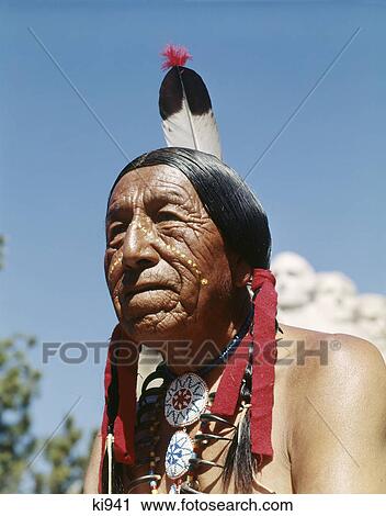 1950S Native American Sioux Indian In The Black Hills Mount Rushmore In Background South Dakota, Usa View Large Photo Image Stock Image - 1950S Native American Sioux Indian In The Black Hills Mount Rushmore In Background South Dakota, Usa. Fotosearch