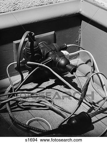 1950S Overloaded Electrical Outlet View Large Photo Image Picture - 1950S Overloaded Electrical Outlet. Fotosearch
