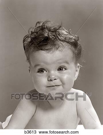 1950S Portrait Baby With Messy Curly Hair & Straight Face View Large Photo Image Stock Image - 1950S Portrait Baby With Messy Curly Hair & Straight Face. Fotosearch