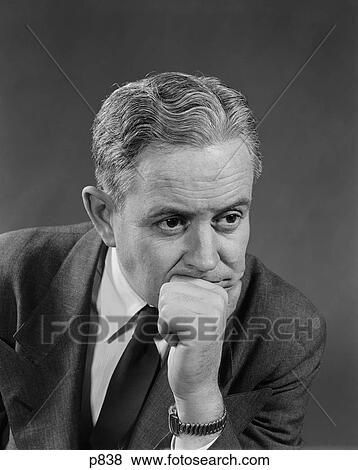 1950S Portrait Depressed Worried Older Businessman Hand To Chin View Large Photo Image Stock Photo - 1950S Portrait Depressed Worried Older Businessman Hand To Chin. Fotosearch