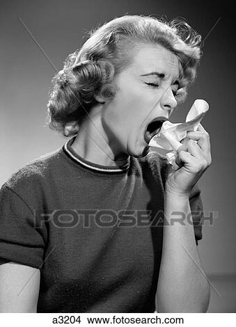 Picture - 1950S Portrait Of Woman About To Sneeze Moving Handkerchief Toward Face. Fotosearch