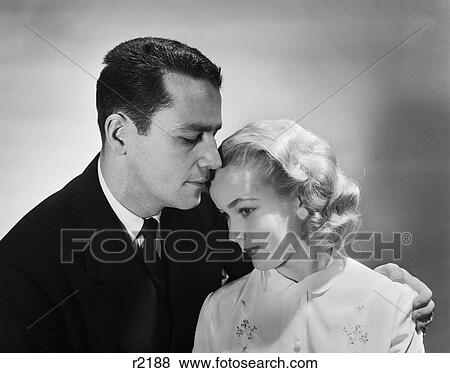 1950S Romantic Portrait Blonde Woman Leaning Her Head On Mans Shoulder View Large Photo Image Stock Photo - 1950S Romantic Portrait Blonde Woman Leaning Her Head On Mans Shoulder. Fotosearch