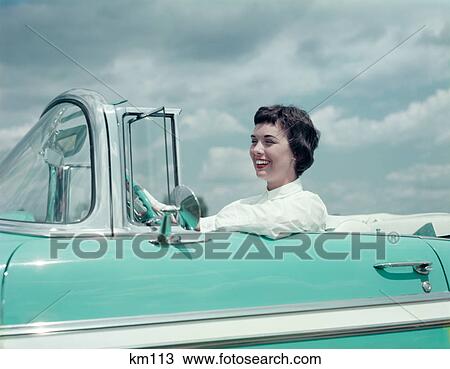 1950S Smiling Brunette Woman Driving Turquoise And White 1955 Chevrolet Convertible Automobile View Large Photo Image Stock Image - 1950S Smiling Brunette Woman Driving Turquoise And White 1955 Chevrolet Convertible Automobile. Fotosearch