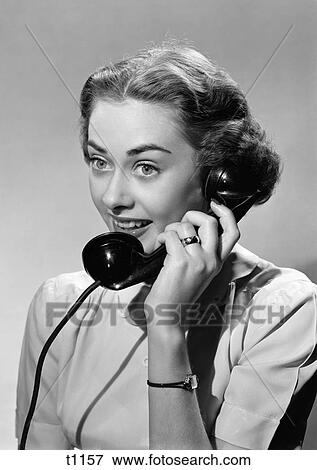 1950S Smiling Woman Talking On Telephone Stock Photo | t1157 | Fotosearch