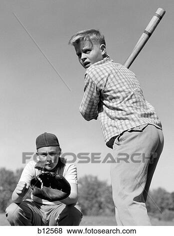 1950S Teen Boy At Bat With Catcher Crouching Behind Him View Large Photo Image Stock Photo - 1950S Teen Boy At Bat With Catcher Crouching Behind Him. Fotosearch