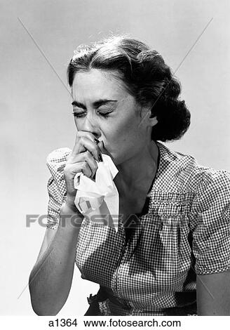 1950S Woman Eyes Closed With Cold Sneezing Into Handkerchief View Large Photo Image Picture - 1950S Woman Eyes Closed With Cold Sneezing Into Handkerchief. Fotosearch