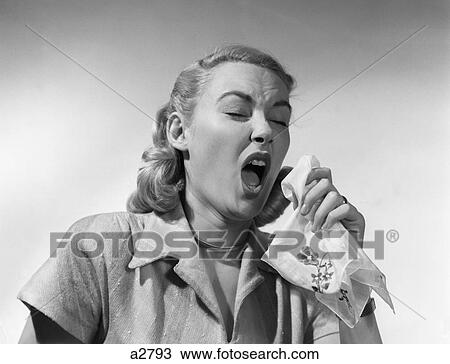 1950S Woman Sneezing Coughing Into Handkerchief View Large Photo Image Stock Image - 1950S Woman Sneezing Coughing Into Handkerchief . Fotosearch