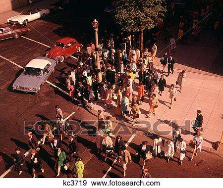 1960S 1970S Boston Pedestrians Crossing Street At Corner View Large Photo Image Stock Photo - 1960S 1970S Boston Pedestrians Crossing Street At Corner . Fotosearch